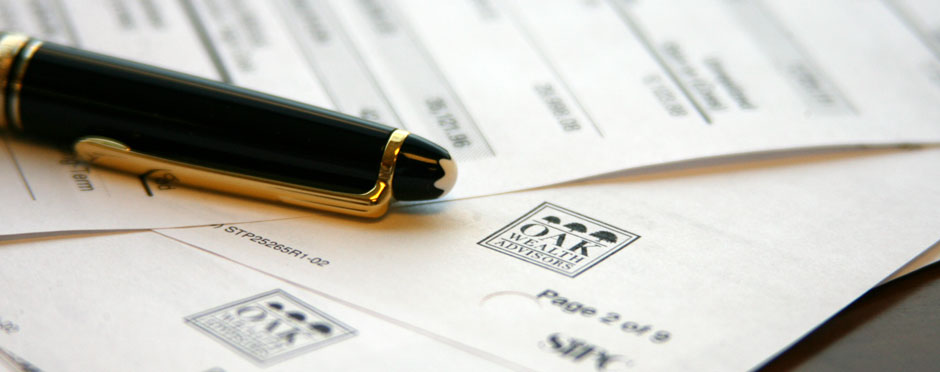 pen and documents about wealth management