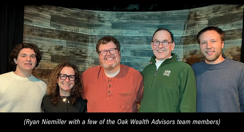 Ryan-Niemiller-with-a-few-of-the-Oak-Wealth-Advisors-team-members